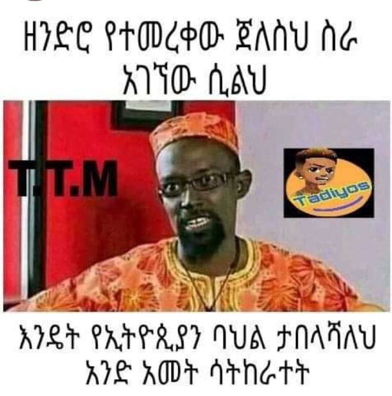 a man in a red shirt and a yellow hat